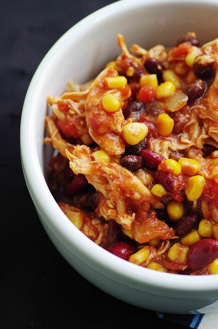 Crock pot chicken chili taco Combine beans, onion, chili peppers, corn, tomato sauce, cumin, chili powder and taco seasoning in a slow cooker. Place chicken on top and cover. Cook on low for 10 hours or on high for 6 hours. Half hour before serving, remove chicken and shred. Return chicken to /5(19).