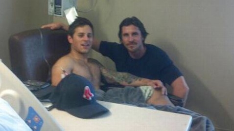 'Dark Knight' star Christian Bale visits shooting victims