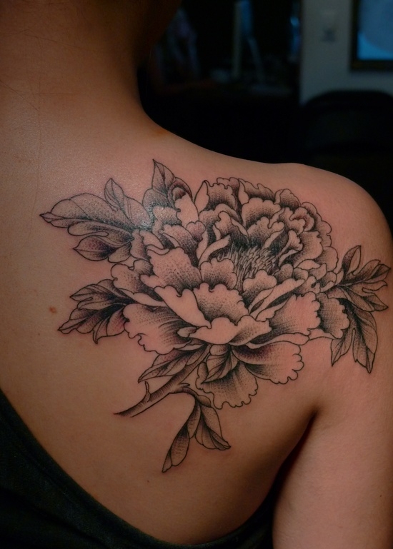 Large flower shoulder tattoo