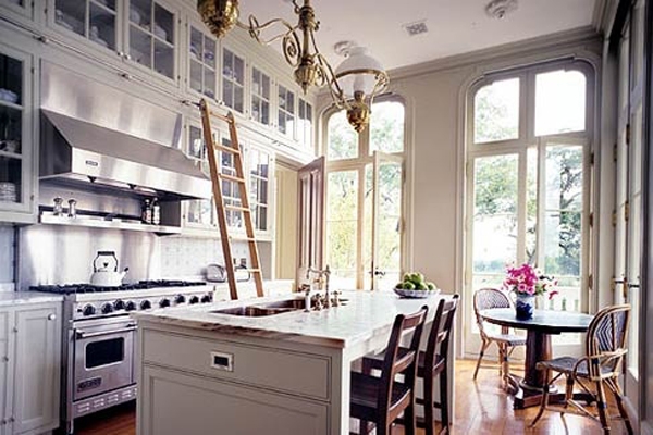 Ladder in the kitchen and lots of cupboards - Image 2