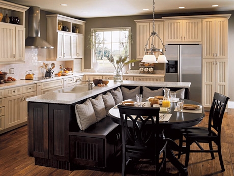Kitchen island combined with bench seating to create a breakfast nook.