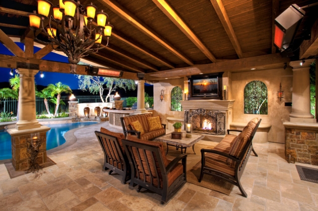 Outdoor living with fireplace and TV