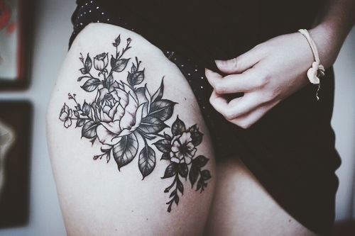 Rose thigh tattoo