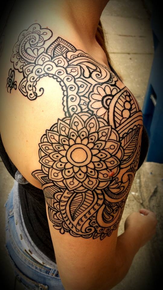 Tribal shoulder tattoo