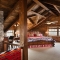 Exposed beam attic bedroom