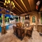 Outdoor living with fireplace and TV - Outdoor Living