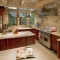 Stone walls and hand hewn beams make this kitchen