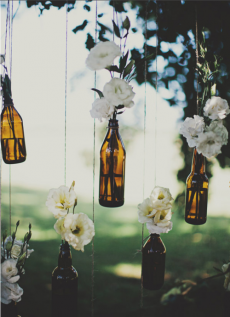Beer bottle vases hanging from tree - Great Wedding Ideas