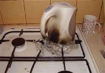 Fail: Electric Kettle Melted On Gas Stove Top - Funny Pics