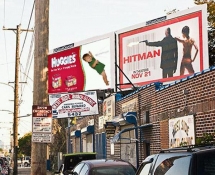 Hitman shoots Huggies wearing toddler - Funny Ads
