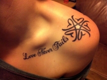 Love Never Fails shoulder tattoo - Tats