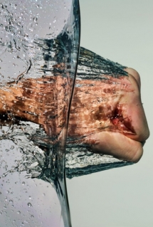 Take that water!  Fist through water [photo] - Fantastic shots