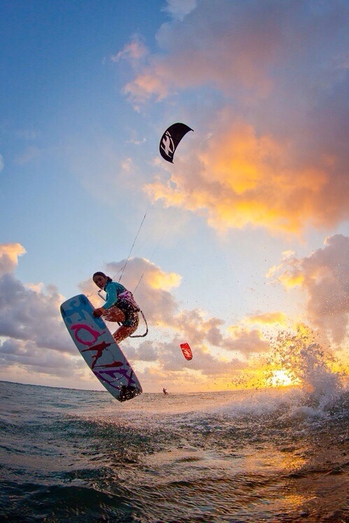 Kiteboarding into the sunset