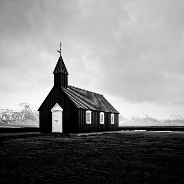Chapel with mountain backdrop