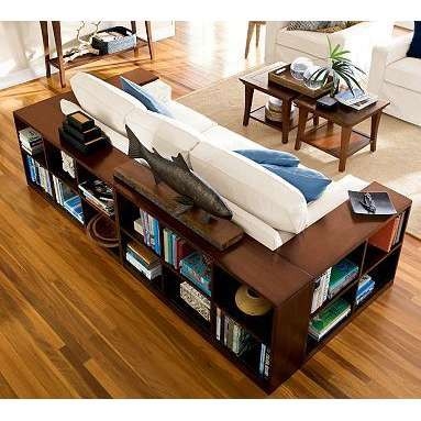Sofa surrounded by bookcase