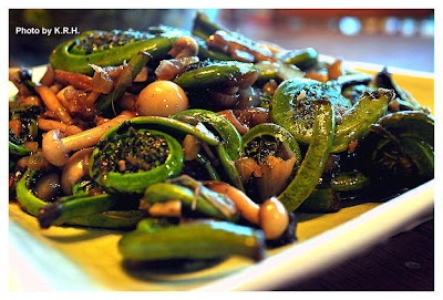 Sauteed fiddleheads and mushrooms
