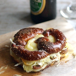 Bratwurst, Muenster Grilled Cheese with Sauerkraut on Soft Pretzel