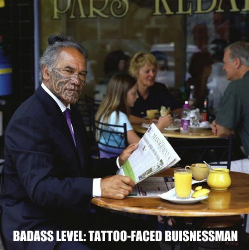 Tattoo-faced businessman