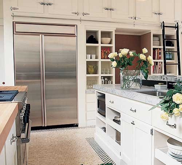 Ladder in the kitchen and lots of cupboards - Image 3