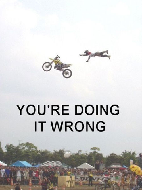 Flying man tries to catch flying motorcycle