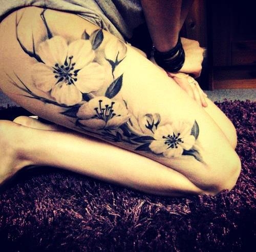 Thigh flower tattoo