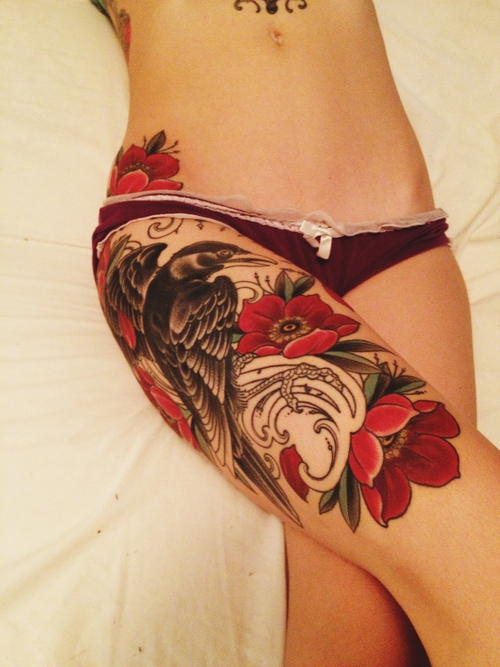 Upper leg tattoo