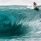 Awe inspiring stand up paddling at Teahupo'o, Tahiti