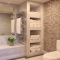 Bathroom with shelves for towels - feels like a spa!