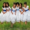 Girls in White Dresses With Blue Satin Sashes - My Favourite Things