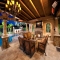 Outdoor living with fireplace and TV