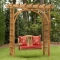 Pergola with swinging bench