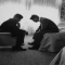 John Kennedy, as a presidential candidate, conferring with his brother Bobby Kennedy