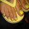 Yellow nails with flower design